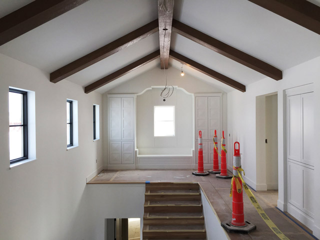 Staircase Landing with Shaped Sheet Rock Ceiling