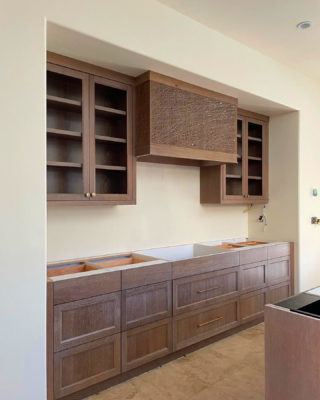 Custom CNC Machined Range Hood Pattern in Cerused Oak Finish with Custom Cabinets in Scottsdale, AZ