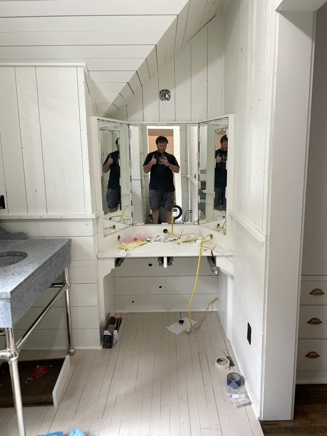 Hinged Mirror in Bathroom